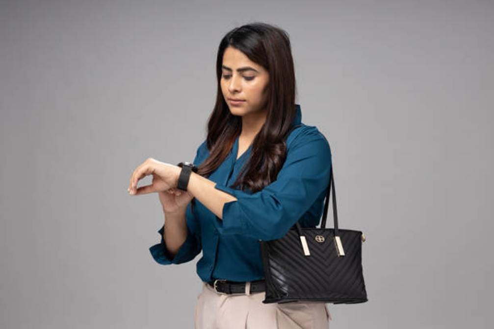 Employee checking time for automated attendance reports