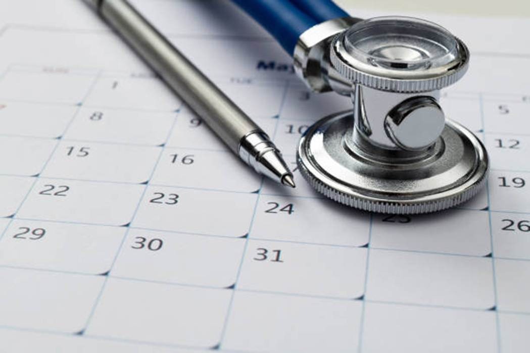 Stethoscope on calendar representing accuracy and reliability