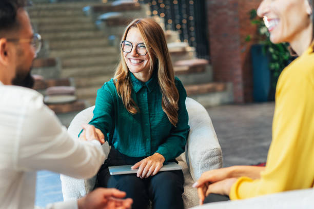 Colleagues discussing time tracking and approval matrix