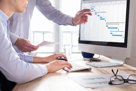 Business team selecting the proper time tracking system