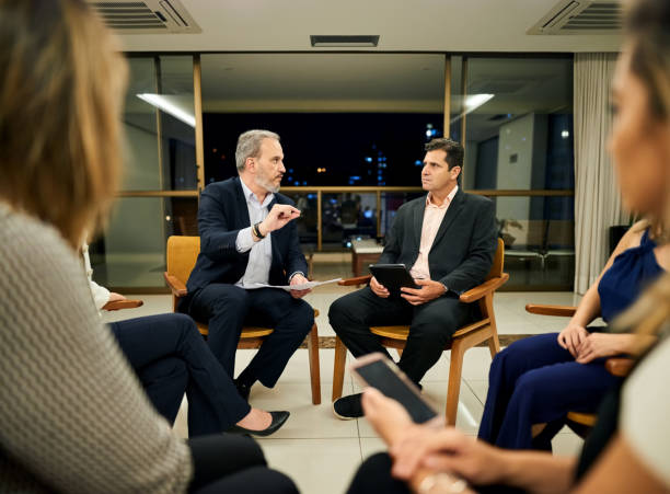 Executives discussing headcount changes and workforce trends