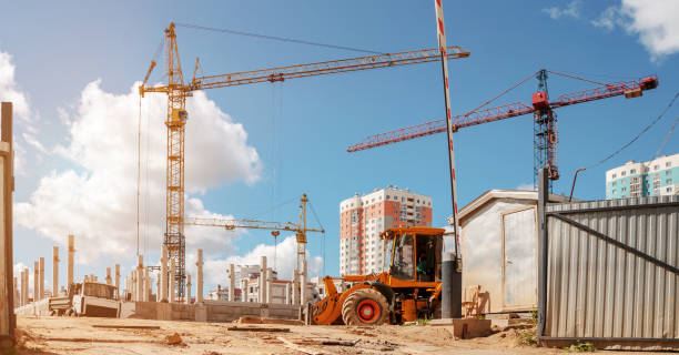 Construction site with cranes and heavy machinery