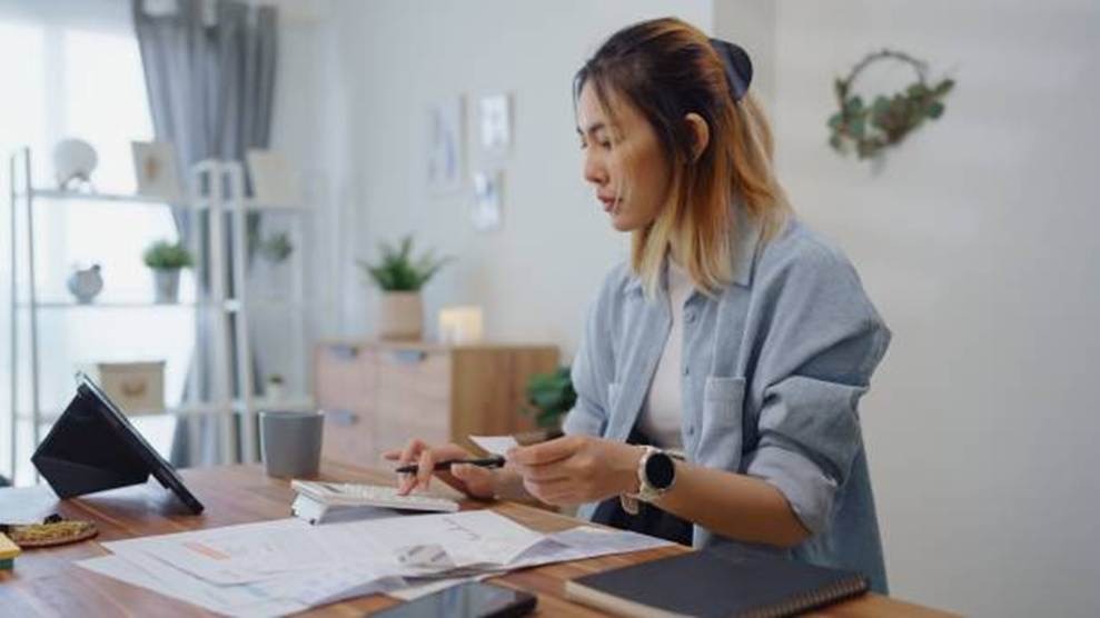 Employee reviewing overtime and absence records