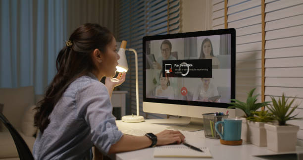 Woman working at a computer monitor