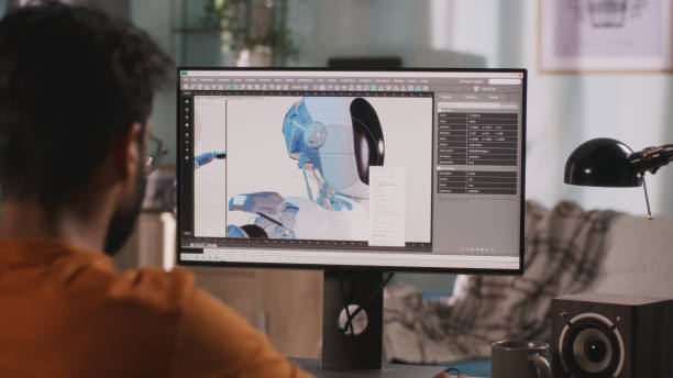 Professional using digital twin software on dual monitors