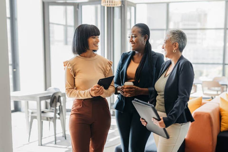 Employees communicating and sharing feedback in the workplace