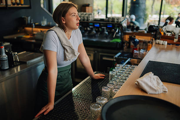 Woman waiting at counter
