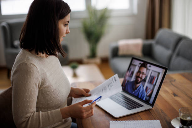 Employee reviewing documents during remote onboarding