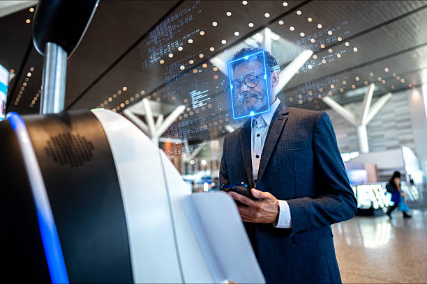 Facial recognition time clock verifying an employee at a workplace terminal