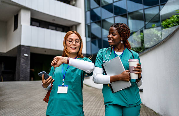 Teaching staff checking time on a smartwatch