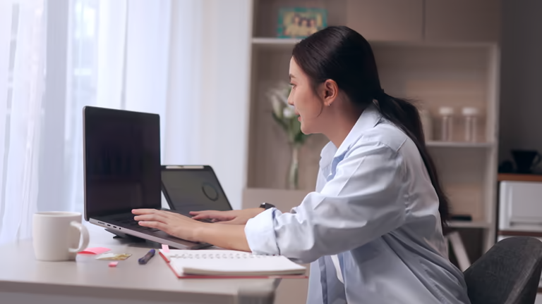 Woman working on grant reporting cycle planning