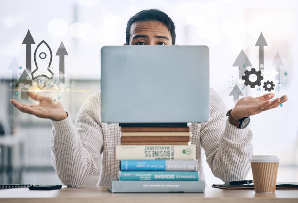 Person looking over books with upward arrows