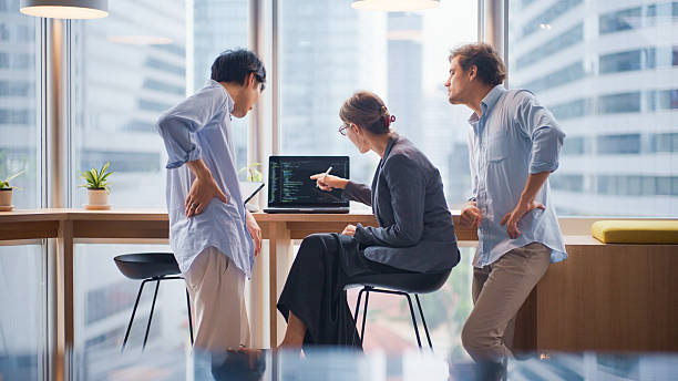 Colleagues analyzing data for hiring decisions