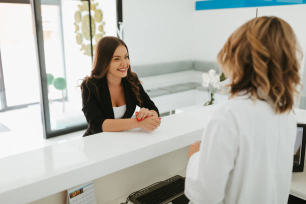 Hospital staff at reception desk