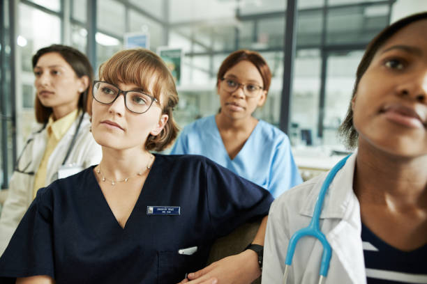 Healthcare staff in hospital hallway