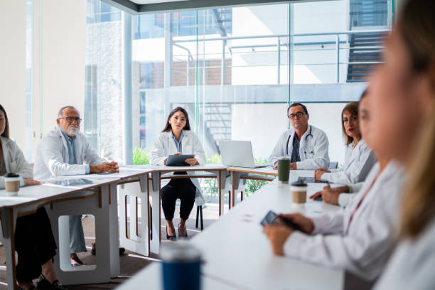 Hospital management and doctors in a meeting