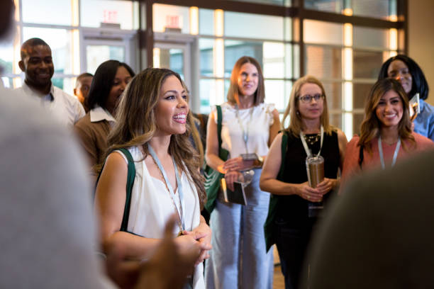 Employees gathering and communicating in an office