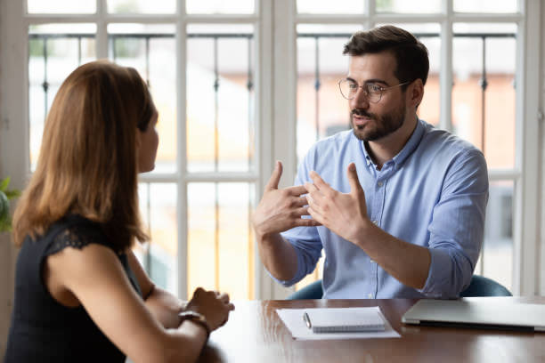 HR and employee discussing timekeeping policies