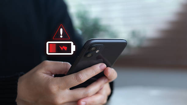 Smartphone displaying a low battery warning icon