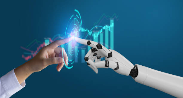 Human hand touching a robot hand