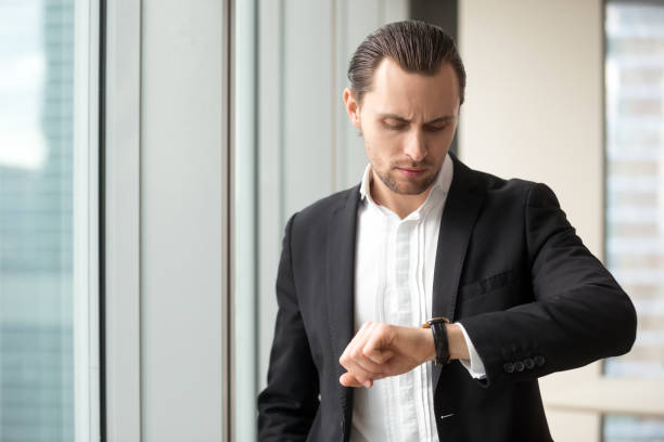 Man looking at his watch