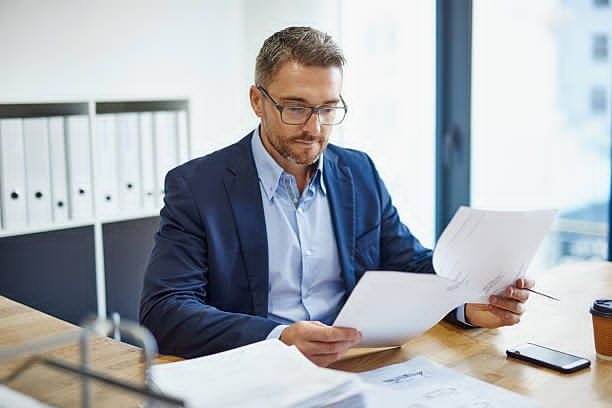Manager reviewing time reports