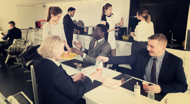 Office environment with people talking