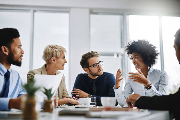 Team discussing missed punch policy in a meeting