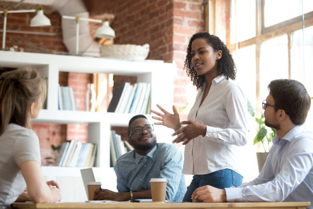 Colleagues discussing in an office