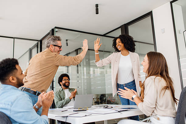 Office team high five