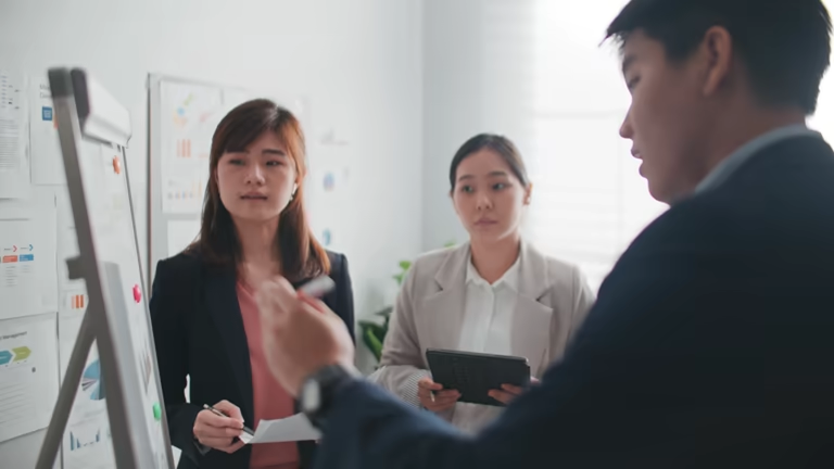 Managers reviewing reconciliation workflow