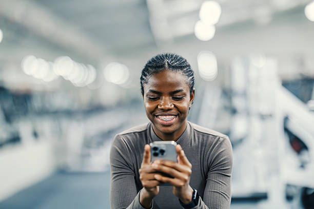 Employee using mobile device for payroll accuracy