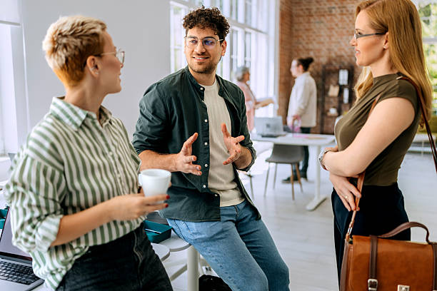 Colleagues discussing auto-deducted break policies