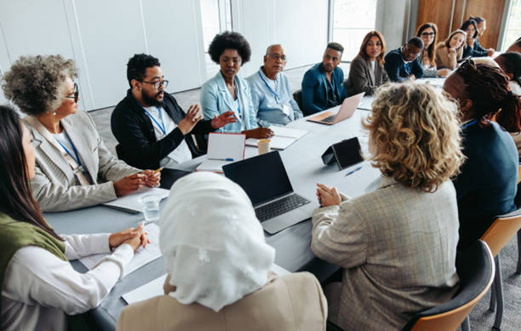 Business team meeting representing real-time workforce notifications