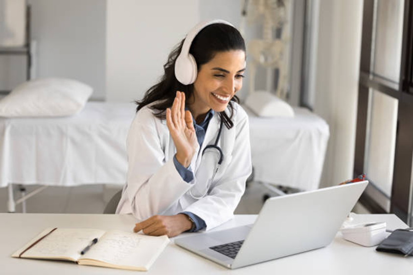 Remote employee attending an online meeting while working from home