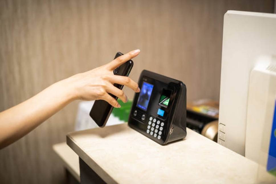 RFID and NFC clock-in device for employee attendance tracking