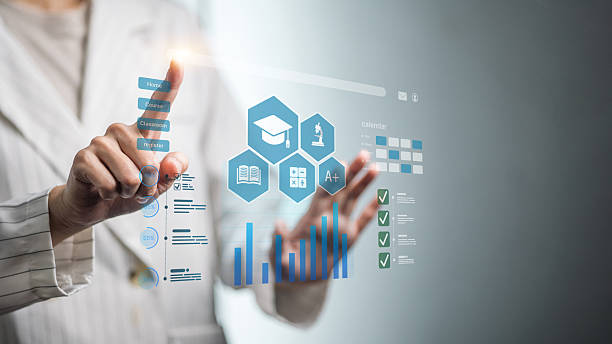 Person touching a futuristic digital interface with charts and icons
