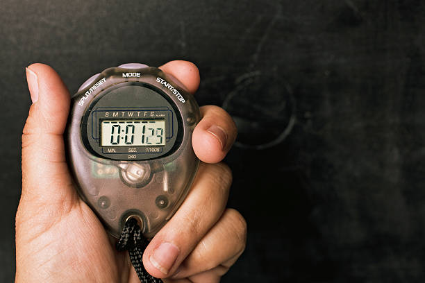 Stopwatch held in hand