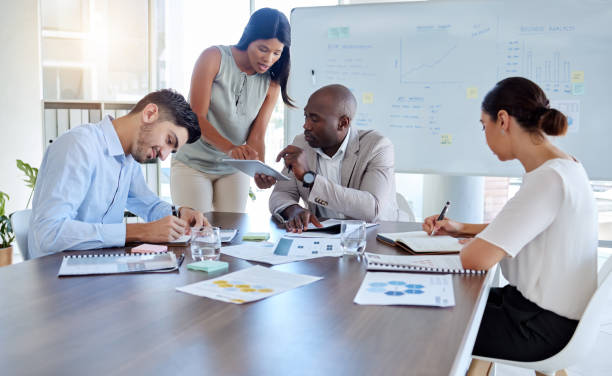 Team meeting discussing attendance