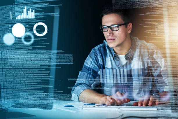 Man working on laptop with digital overlay