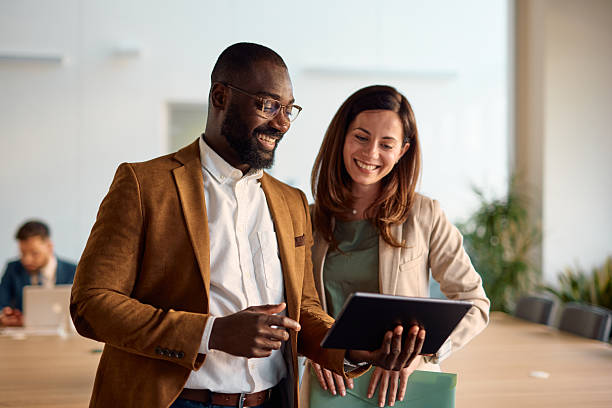 Colleagues reviewing a punch process on a tablet
