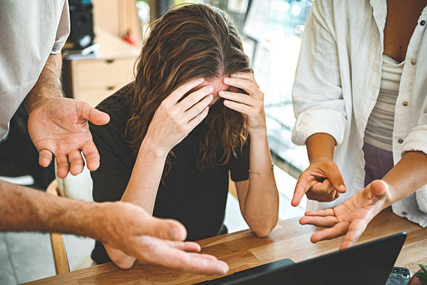 Employees discussing timekeeping policy during an unemployment dispute