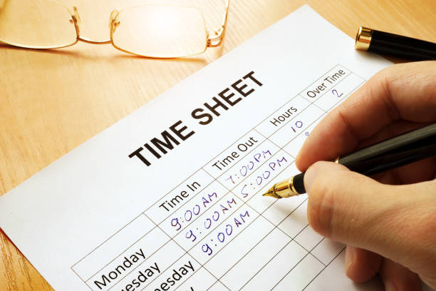 Hand writing on a Time Sheet