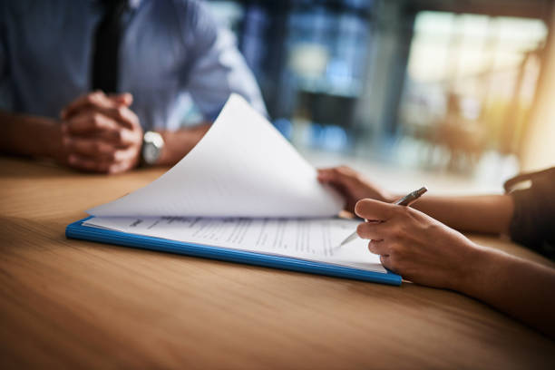People reviewing documents