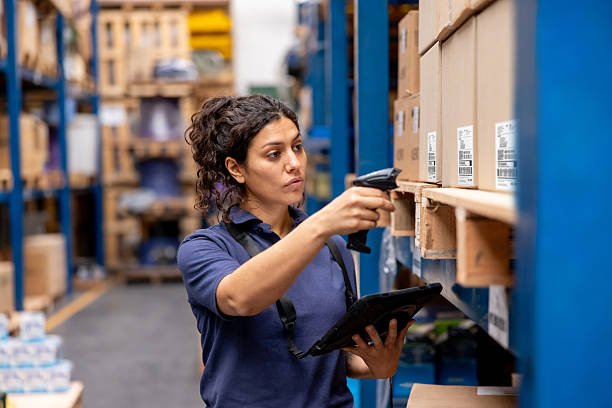 Warehouse supervisor using a tablet