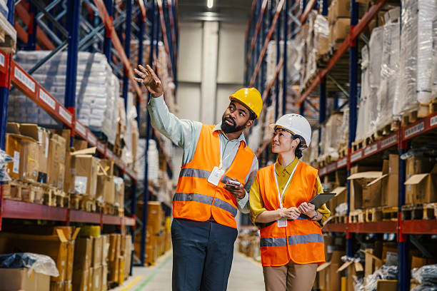 Warehouse workers communicating
