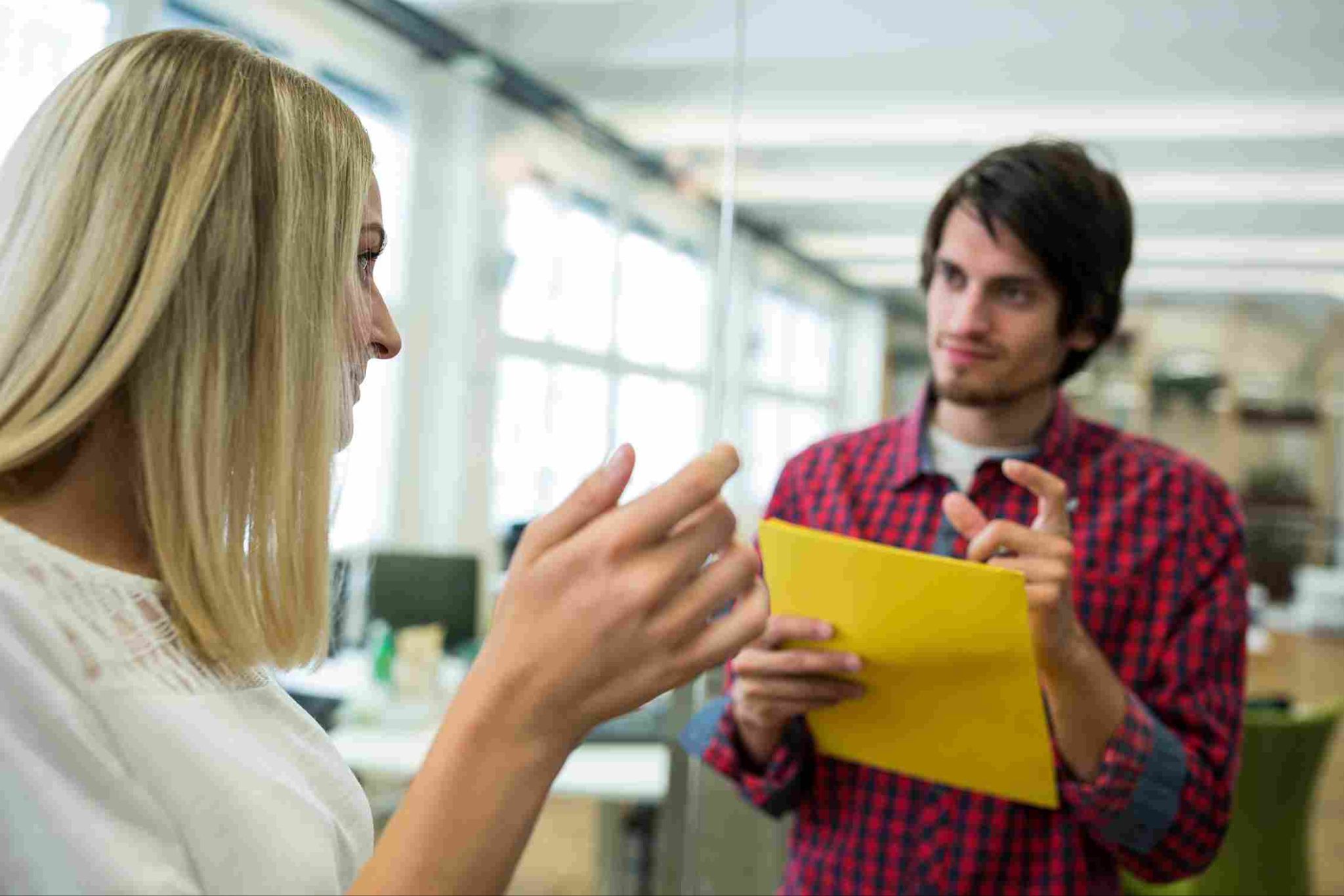 Colleagues discussing attendance warning letter