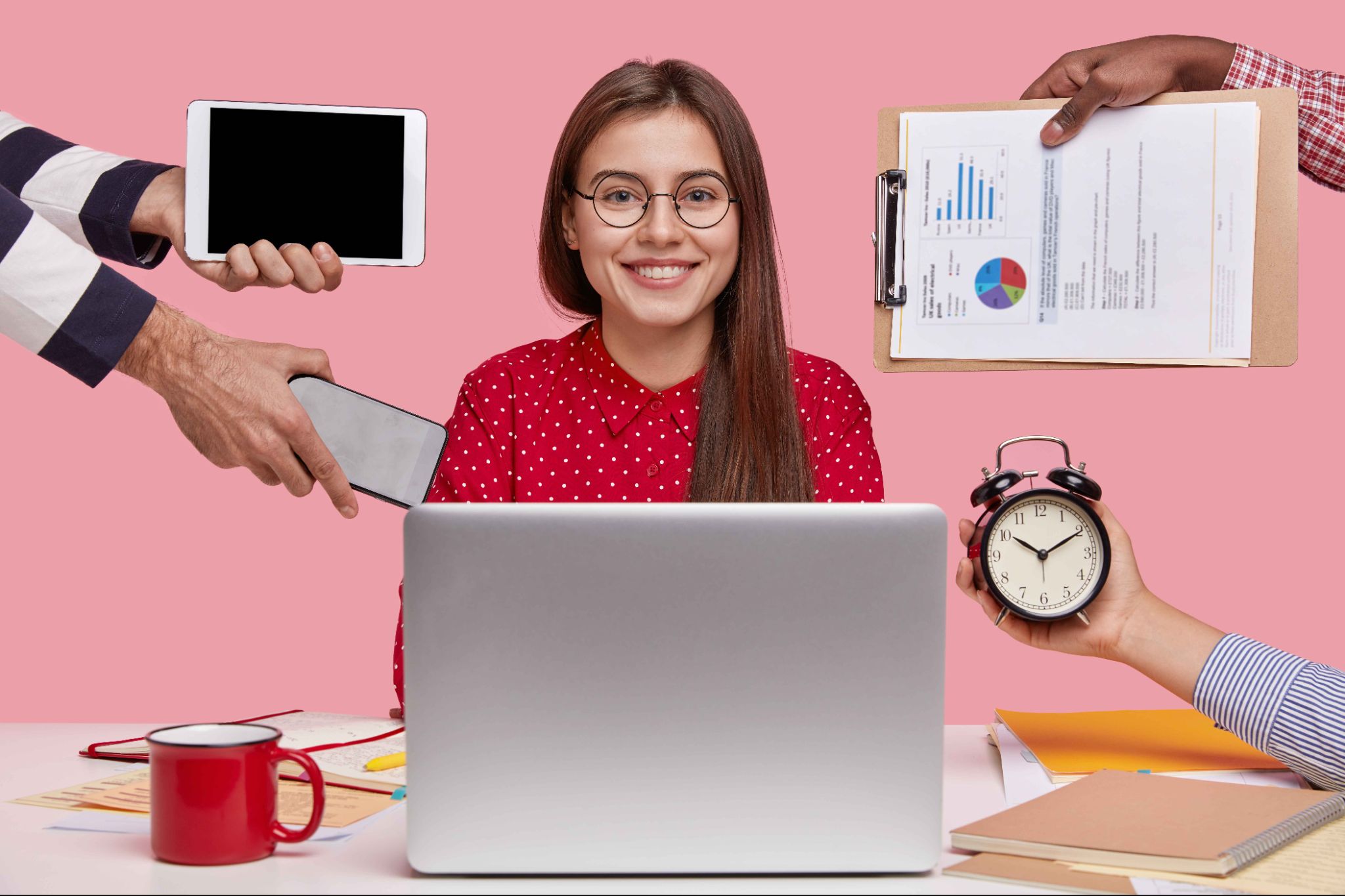 Employee using laptop with work tools and clock for overtime calculation