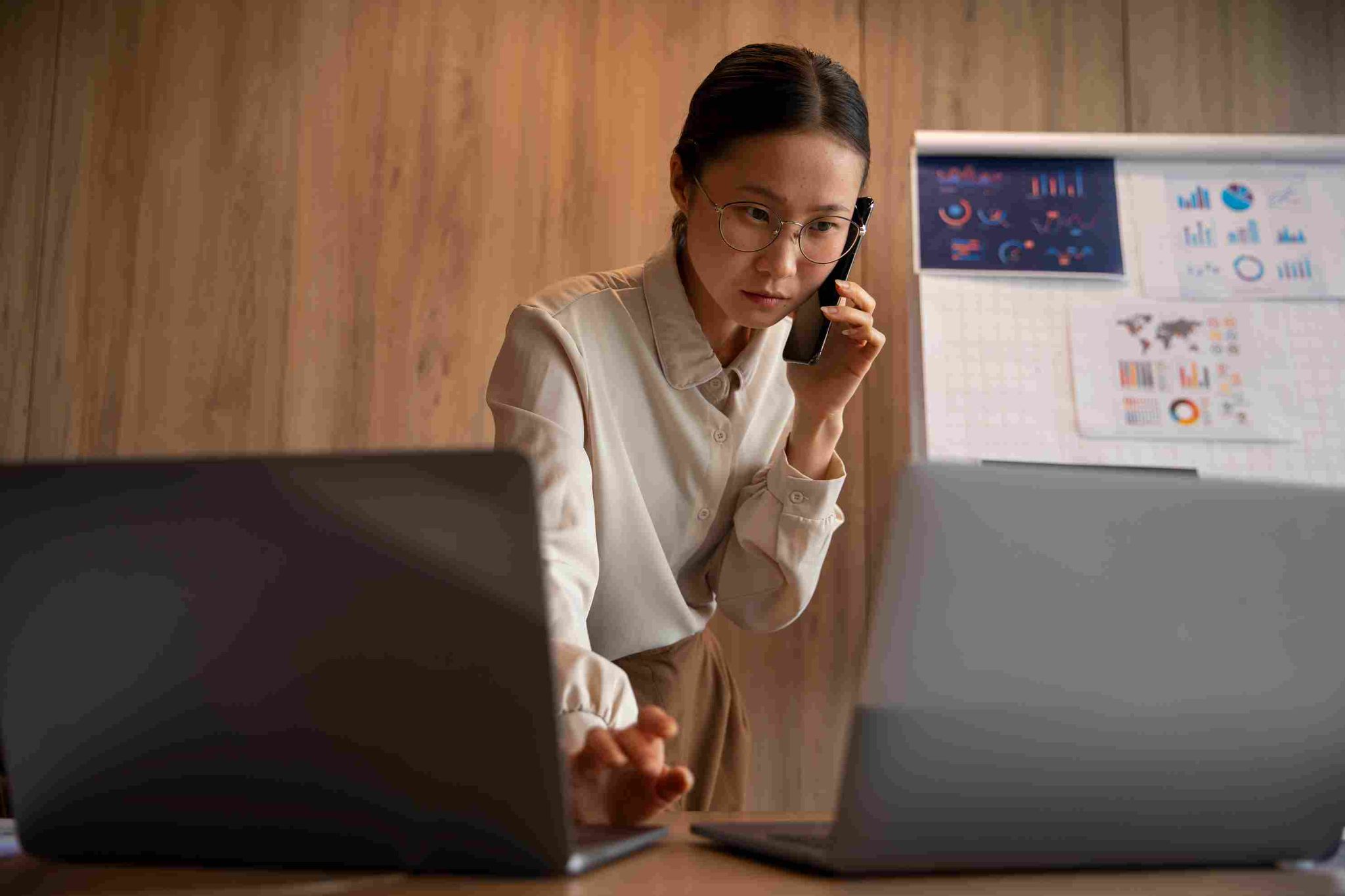 Professional reviewing compliance software on laptop