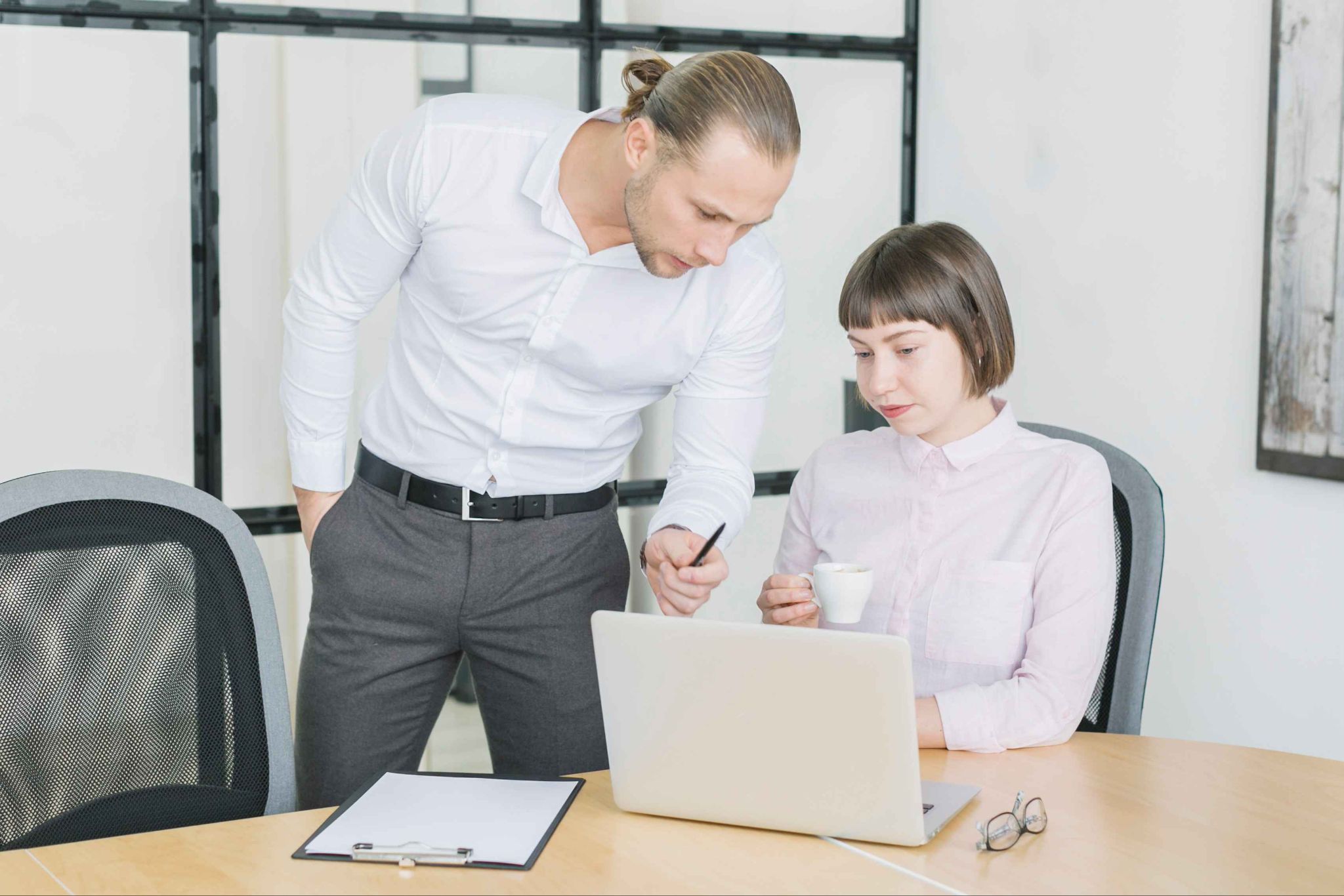 People looking at laptop